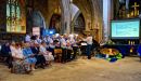 The MU Choir led the opening song 'Take me Up the Tyne'